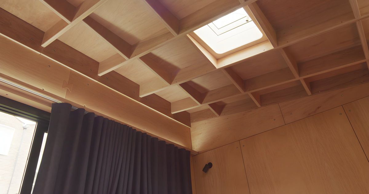 Ply coffered ceiling with the skylight above the curtain