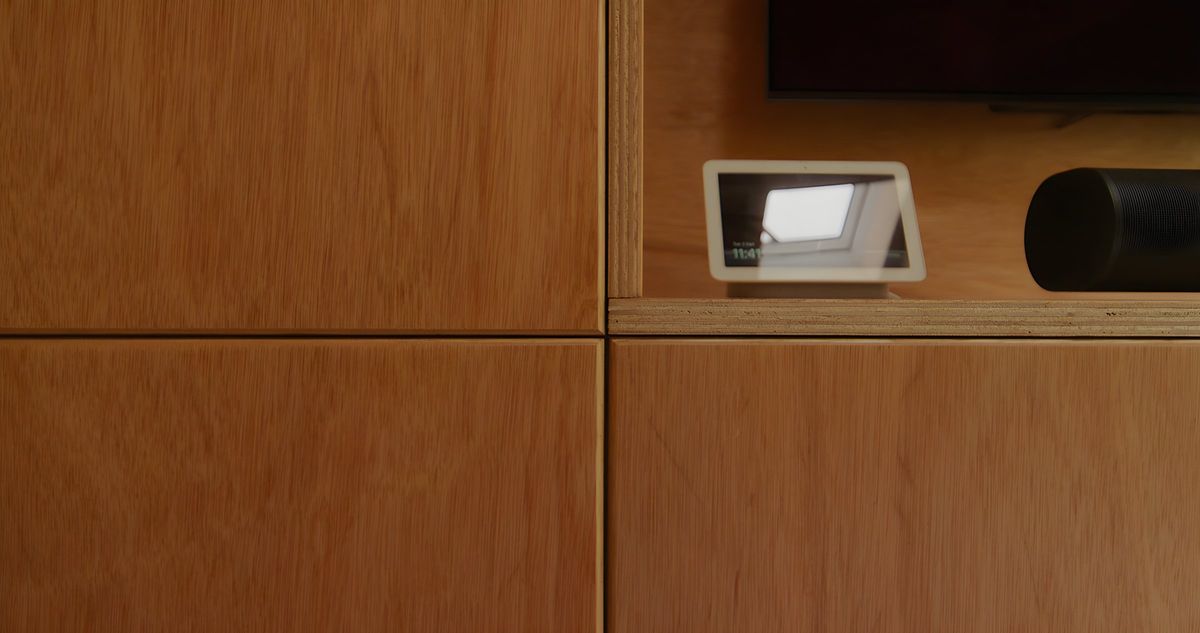 Cabinet doors and a smart home device in the TV unit