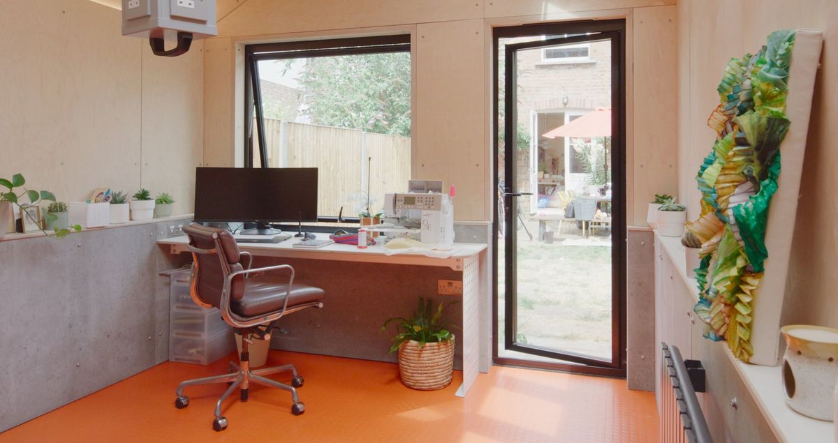 Desk under the window, glazed door to the garden