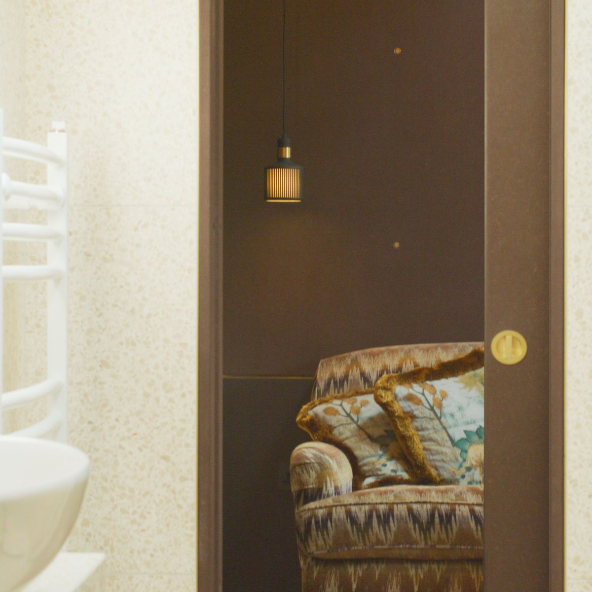 From the WC basin through the door to the armchair in the studio